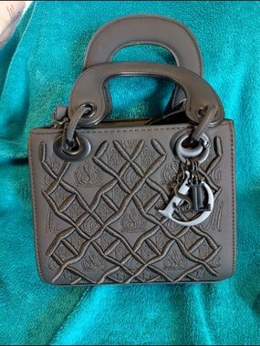 Gray Quilted Tote with Charm Accent